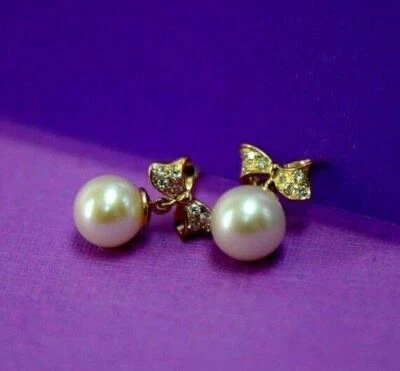 Pendientes de pajarita de oro amarillo blanco 14k perla circonita agua dulce Foto 1 de 4