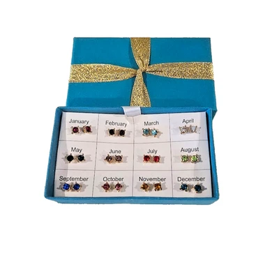 Calendario todo en uno doce, perforados, aretes en caja de firma azul Foto 1 de 2