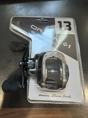 13 Fishing Origin 01 BlackOut Baitcasting Reel Left Hand 5BB 7.3:1 - Image 1 of 4