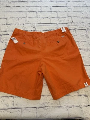 Pantalones Cortos Chinos IZOD Saltwater 40 Frente Plano para Hombre, Naranja Petardo, Nuevos con Etiquetas Foto 1 de 4