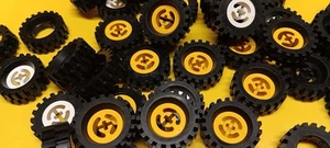 53 LEGO Lot 3482 & 2346 Wheel W/ Split Axle Hole W/ 30x10.5 Tire Yellow, White - Picture 1 of 2