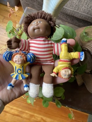 Mini parche de repollo vintage niño afroamericano.  Boy-Rudy Pin Up Cheerleaders PVC Foto 1 de 4