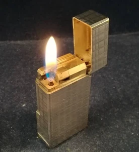 Encendedor de gas Flaminaire Vinci patrón de rejilla plateada totalmente funcional sin caja Francia JP - Imagen 1 de 10