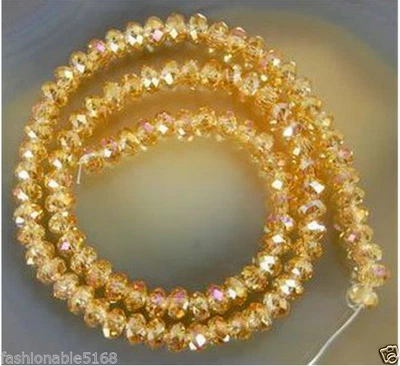 Wholesale Crystal loose charm glass beads jewelry  gold champag AB 4*6mm 240 pcs - Image 1 of 4