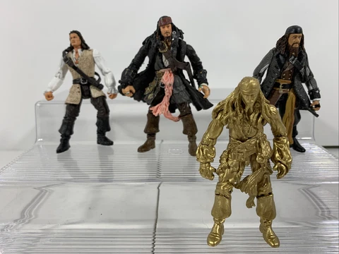 Lot of 4 Disney’s Pirates of the Caribbean Dead Man’s Chest 3 1/2” Figures Cover