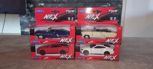 NEX WELLY Modellautos 4 verschiedene Modelle NEU Ford 1:34 - 1:39 - Bild 1 von 2