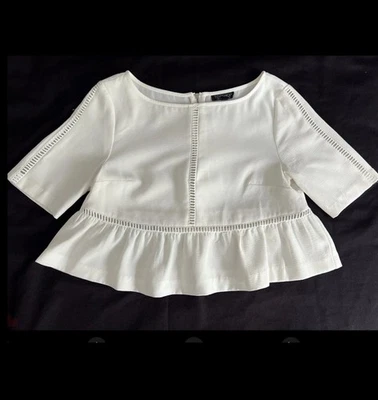 TOPSHOP Blusa Top Corta Peplum Con Ojales Blancos con Volantes Blanca Cremallera TALLA 2 USADA EN EXCELENTE ESTADO h Foto 1 de 4