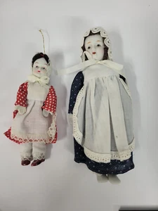 VTG Lot of 2 Porcelain Bisque 7" & 5.5" Dolls White Aprons Cloth Body Bonnets - Picture 1 of 4