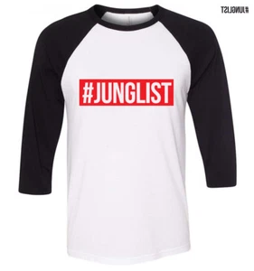 Camiseta Junglist Jungle Music Drum n Bass DnB Negra Raglan Mangas Largas Sport-Tek - Imagen 1 de 1