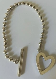 GUCCI BRACCIALE ARGENTO A PALLINI CON CUORE CON SCATOLA OTTIME CONDIZIONI. - Foto 1 di 4