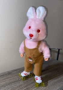 VINTAGE PINK EASTER BUNNY RABBIT W ROLLER SKATES PLUSH TOY MUSICAL SOUND WORKS - Picture 1 of 16