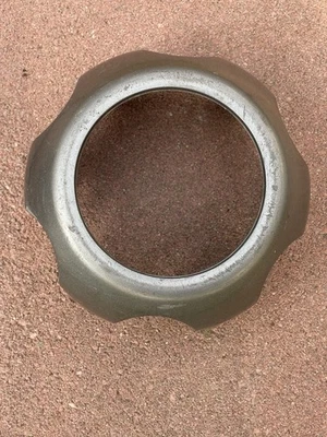 Nissan Xterra Frontier 1999-15 OEM gris grafito 4x4 tapa central de rueda con orificio abierto Foto 1 de 4