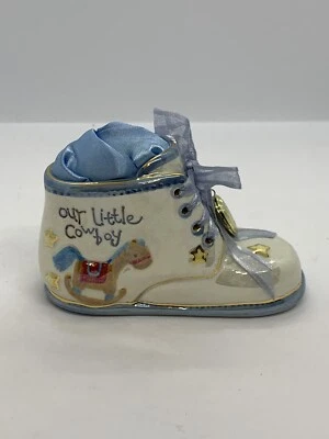 Caja de música de porcelana Our Little Cowboy zapato de bebé pasos de bebé recién nacido juega Bonanza Foto 1 de 4