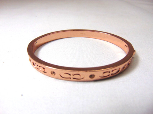 Bracciale Coach in rame con cerniera firma CC C 2 3 8" X 2"