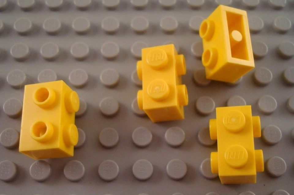 LEGO Lot of 4 Yellow 1x2 Specialty Building Bricks with Side Studs - Image 1 of 1