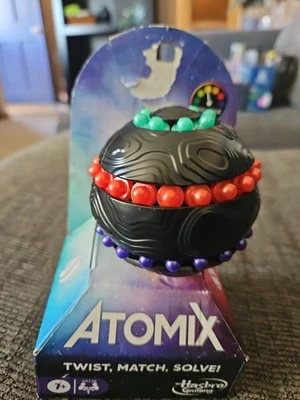 Hasbro Gaming Atomix Puzzle Ball – Twist Match Solve Brain Teaser Toy Ages 7+ - Image 1 of 3