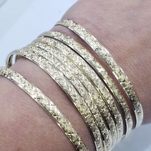 Womans 14k Yellow Gold semanario 7 bangles bracelets 2.50 inch