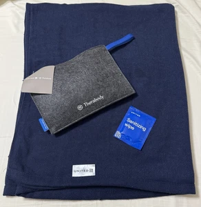 THERABODY United Airlines Amenity Kits Felt Wristlet Bags NEW Unopened & Blanket - Picture 1 of 6