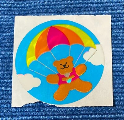 Vintage 80's Sandylion Bear Parachute Clouds Foil Sticker Mod 1982 988A - Image 1 of 2