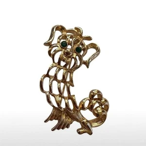 Vintage Avon Gold Tone Dog Brooch with Green Rhinestone Eyes - Picture 1 of 5