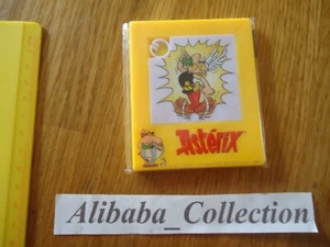 NEU NECKENSPIEL ** ASTERIX OBELIX ** TRANK BOXEN GELB SPIELZEUG KOPFBRUCH - Bild 1 von 2