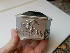 Hex Shaped Silver Color Metal Bank Featuring Ducks and Umbrellas - Picture 1 of 4