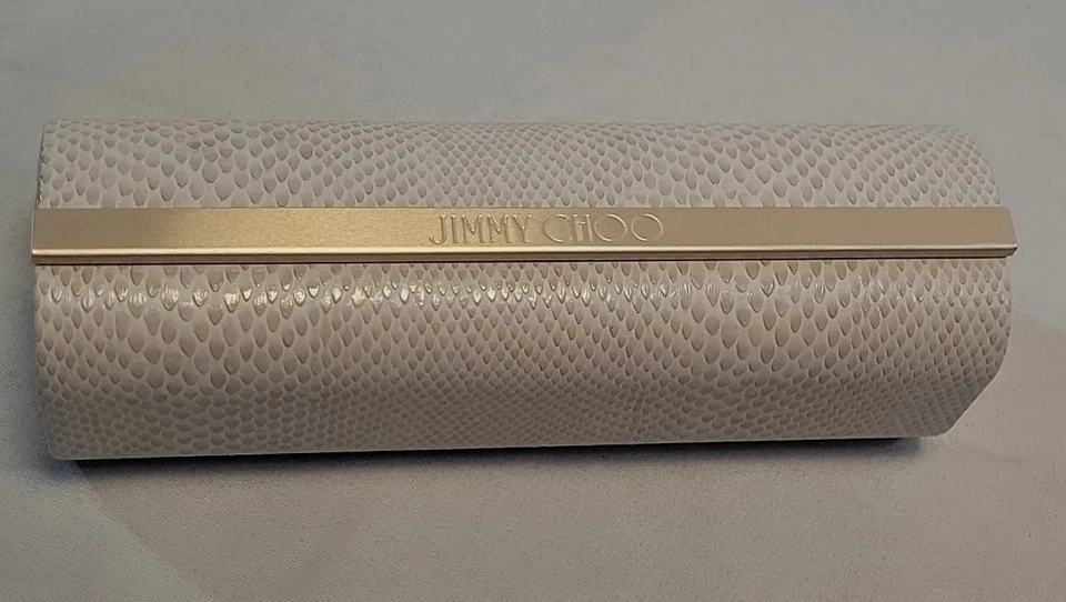 Estuche de gafas Jimmy Choo imitación blanca piel de serpiente detalle barra dorada cierre magnético Foto 1 de 4