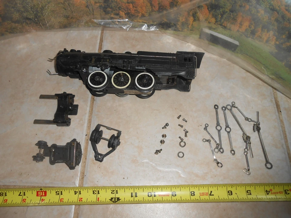 S scale American Flyer 310 or 312 engine Parts. Buyers choice. - Image 1 of 1