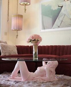 Lying girl coffee table pink