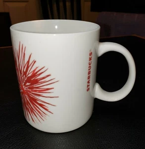 Starbucks Red Starburst Fireworks 12 Oz Coffee Cup Mug 2014 - Picture 1 of 4