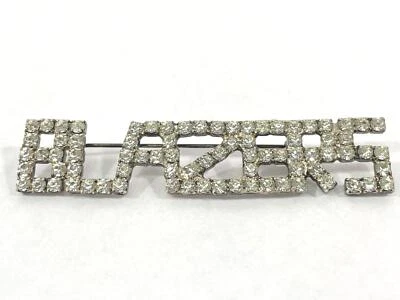 Spilla In Bronzo Con Strass "BLAZERS" - Pietre Trasparenti - Gioielli Usati - Immagine 1 di 4