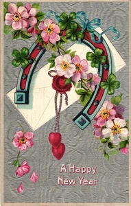 Postal de Feliz Año Nuevo en relieve vintage con herradura y flores 1910 - Imagen 1 de 2