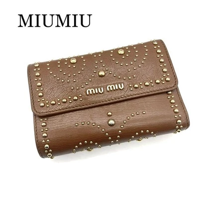 MIUMIU Miu Miu Tres Pliegues Cartera Tachuelas Marrón Foto 1 de 4