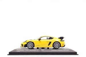 Minichamps 1:43 Porsche 718 Cayman GT4 RS (982) in Racing Yellow / Silver Wheels - Picture 1 of 9