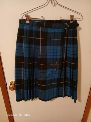 Falda escocesa a cuadros vintage azul real, negra y amarilla Claude Brand mezcla de lana talla 12 Foto 1 de 4