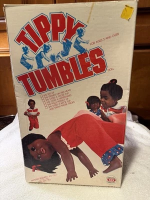 Ideal Tippy Tumbles 1195-7 afroamericano se apoya en la cabeza, backflip y otros Foto 1 de 4