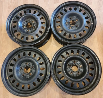 JUEGO DE (4) LLANTAS 16" FORD TAURUS, FÁBRICA MERCURY OEM ACERO NEGRO 16x6 2000-2007 Foto 1 de 4