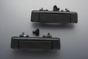 85 - 98 FORD COURIER MAZDA BRAVO B2000 B2200 B2600 PAIR OF BLACK DOOR HANDLE 2X - Picture 1 of 3