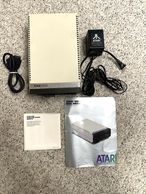 Vintage Atari 1050 5.25" Floppy Disk Drive  - Manual, Power Supply, Op Sys Disk - Image 1 of 4