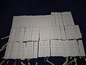 56 x Official Nintendo Wii Remotes Job Lot Spares Repairs Untested - Picture 1 of 10