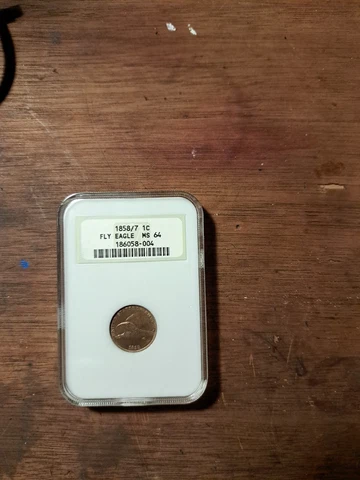 1858/7 Flying Eagle FS-301 MS64 late Die State NGC Cover