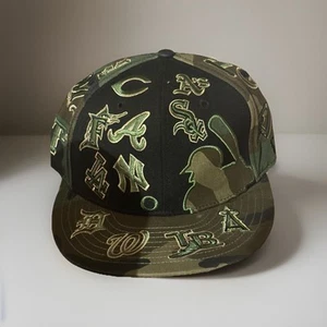 MLB All Over Logos New Era 59Fifty Fitted 7 1/4 100th Season Camo Hat Batterman - Picture 1 of 3