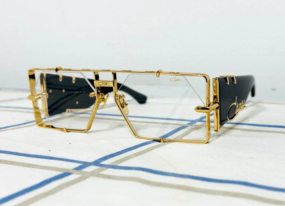 Gafas de sol Cazal con montura negra y dorada lentes transparentes para hombre y mujer Foto 1 de 4