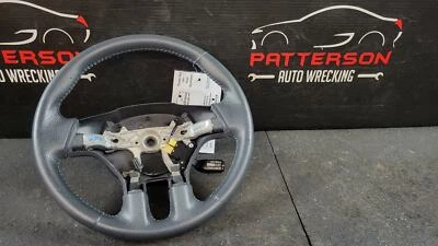 Volante Mitsubishi Eclipse 2012 envuelto en cuero Foto 1 de 4