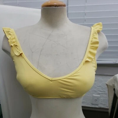 Top de bikini Lauren Ralph Lauren con volantes amarillo mediano precio de venta sugerido por el fabricante 74 USD Foto 1 de 4