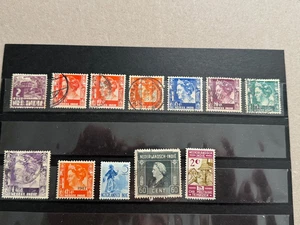 Netherlands Indies group of 12 stamps loose Scott Cat 165/B21 1933-1947  dups - Picture 1 of 2