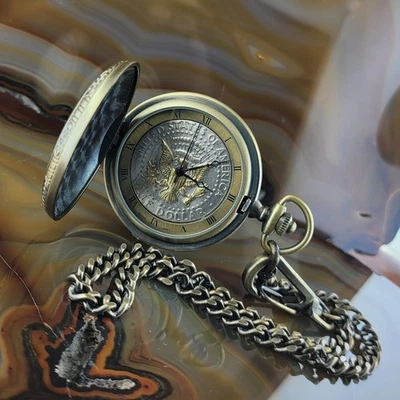 Vintage MAJESTI Company Half Dollar Pocket Watch Pinstripe Embossed Case - Image 1 of 3