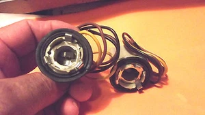 2x1034,1157-1157A,2057,2057A,NA+2357 ENCHUFES BOMBILLA,A GRANEL,NUEVO,NO EN CAJA.2.4. - Imagen 1 de 2