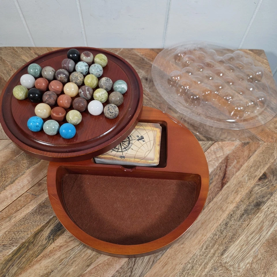  Classic Wooden Solitaire Game with 33 Mineral Marbles - Image 1 of 4