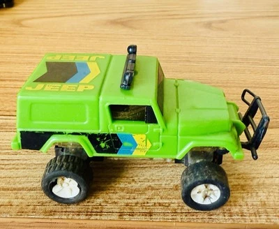 Camión motorizado Mattel 1982 verde lima Jeep 4x4 Power Devils #5573 juguete todo terreno Foto 1 de 4